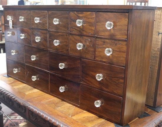 A set of chemist drawers, W.126cm